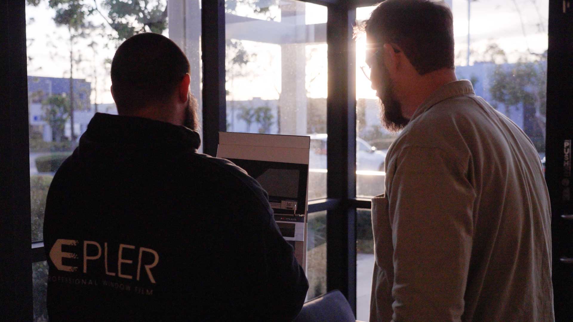 Kepler Specialist Discussing Commercial Window Tinting Prices with Customer in North Dakota