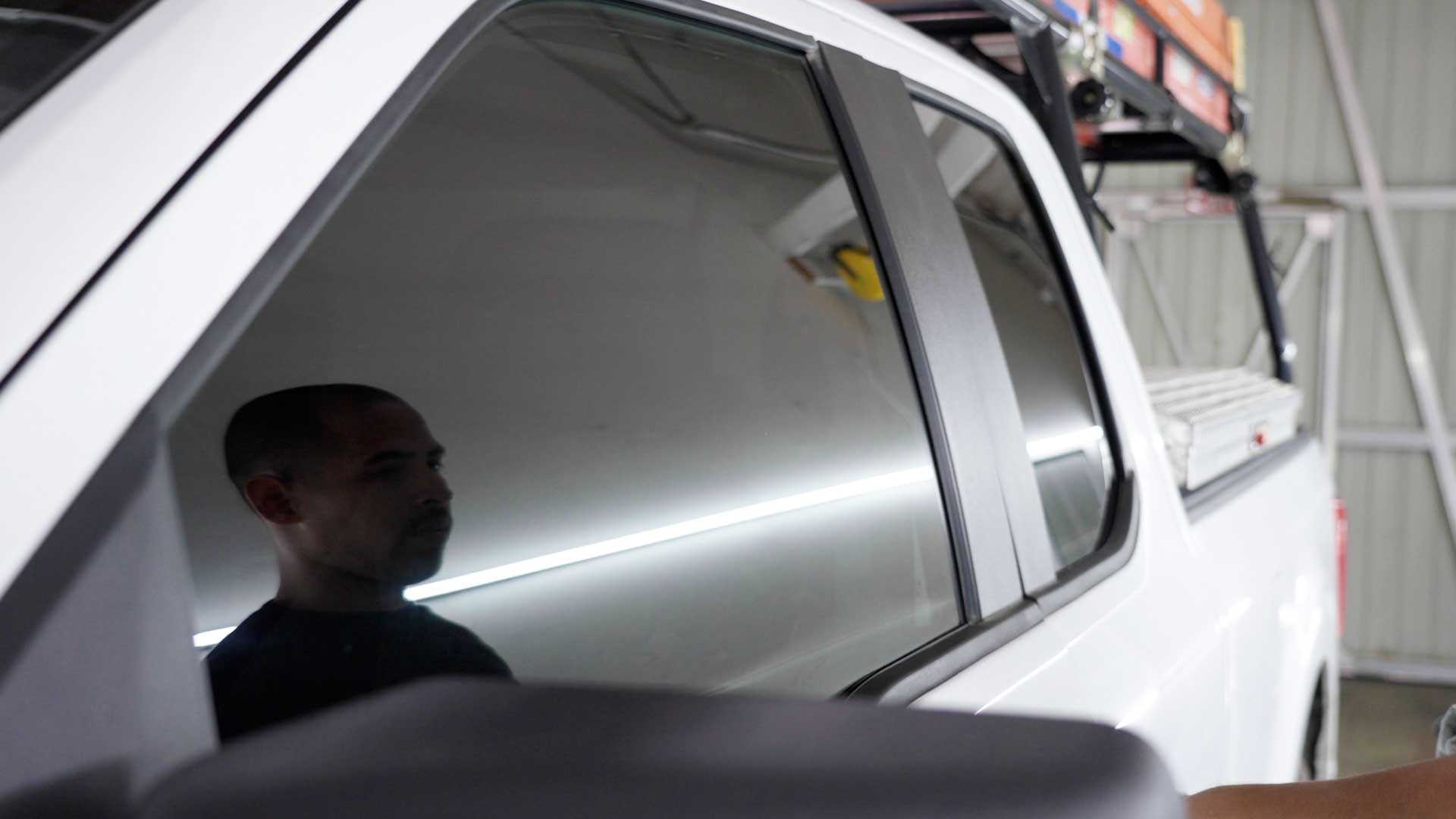 Expert Tesla Glass Tint being cleaned after tinting in Rocky River