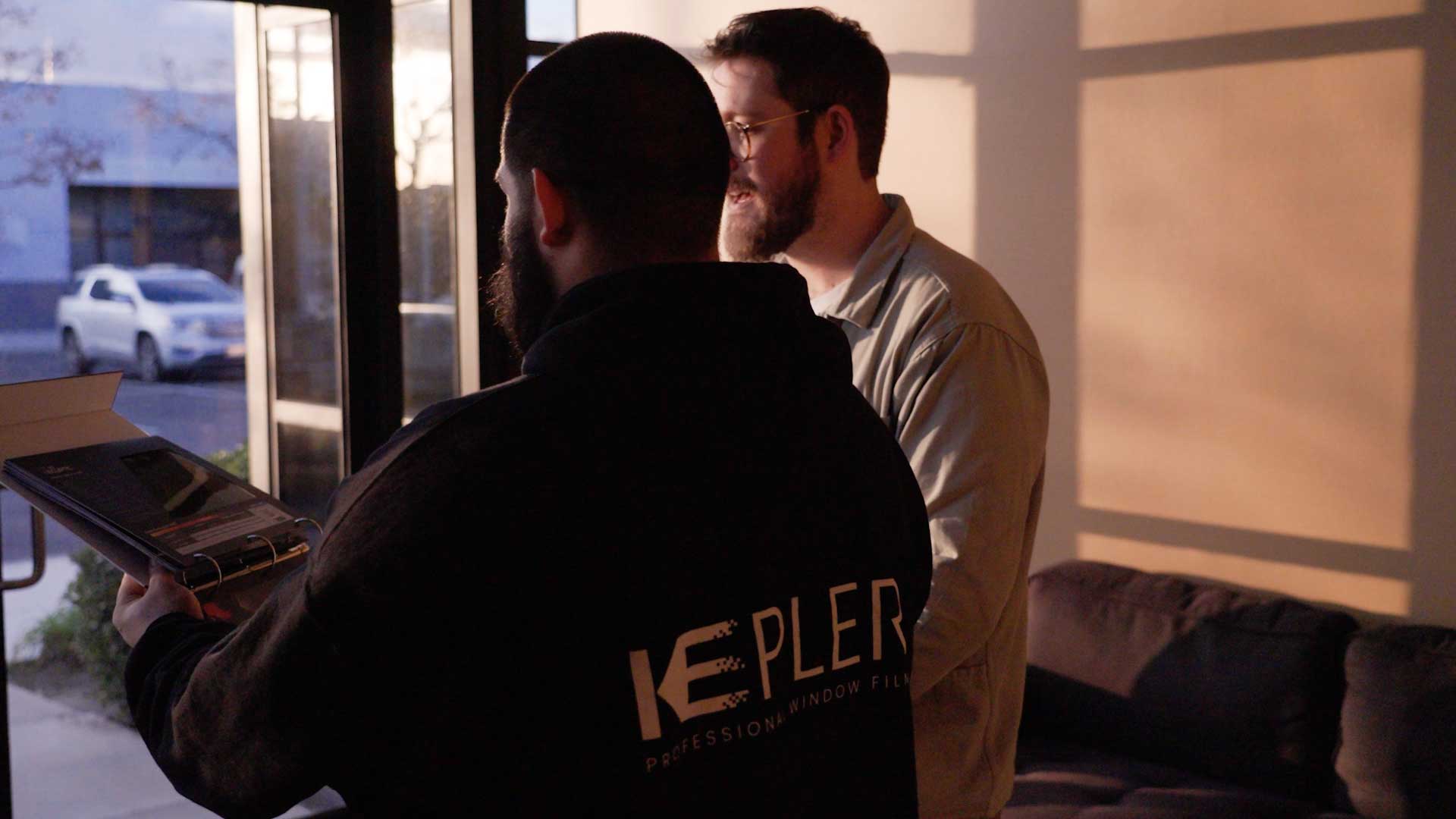 Kepler Specialist Discussing Commercial Window Tinting Prices with Customer in Washington