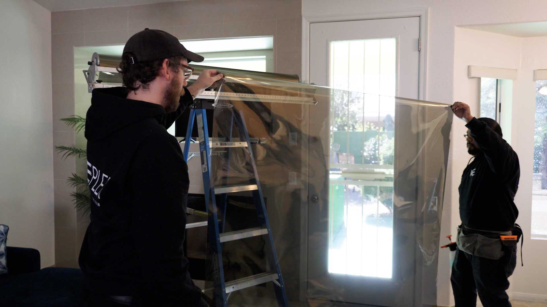 Preparing a Window for Anti-Graffiti Film Installation in Texas