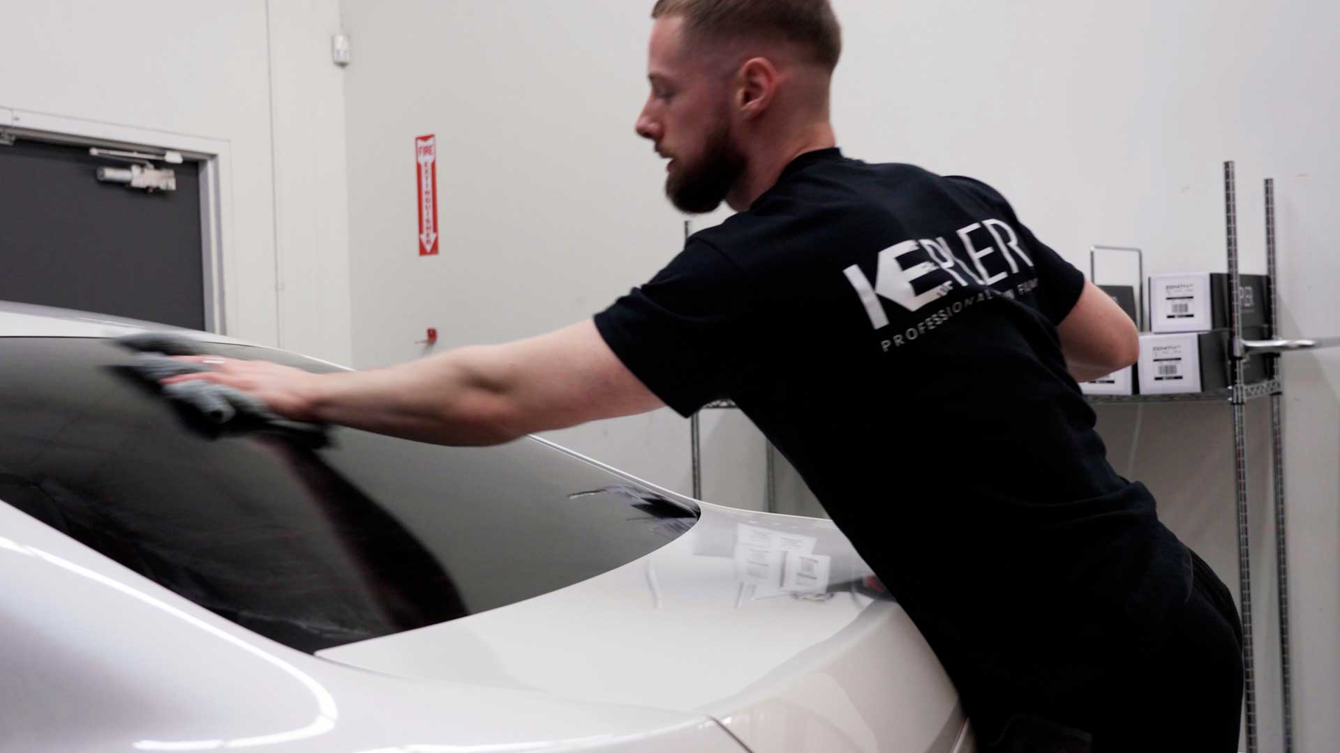 Skilled Tesla Glass Tinting being cleaned after tinting in Warminster