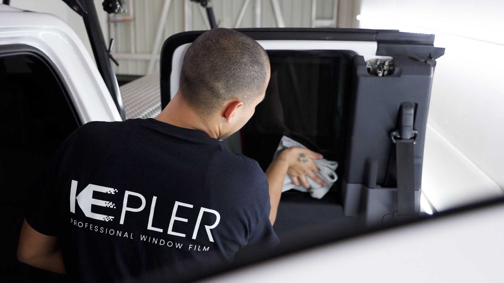 Skilled Tesla Glass Tinting being cleaned after tinting in Lithia Springs