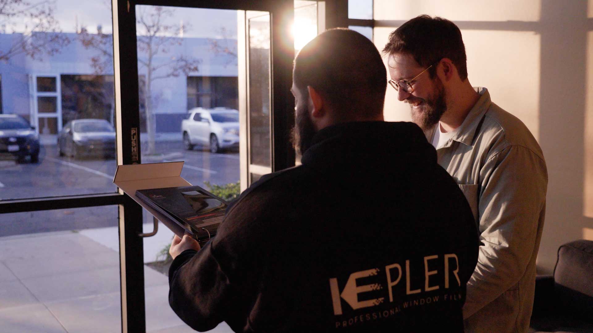 Kepler Dealer Showing Customer the Benefits of Commercial Window Film in Massachusetts