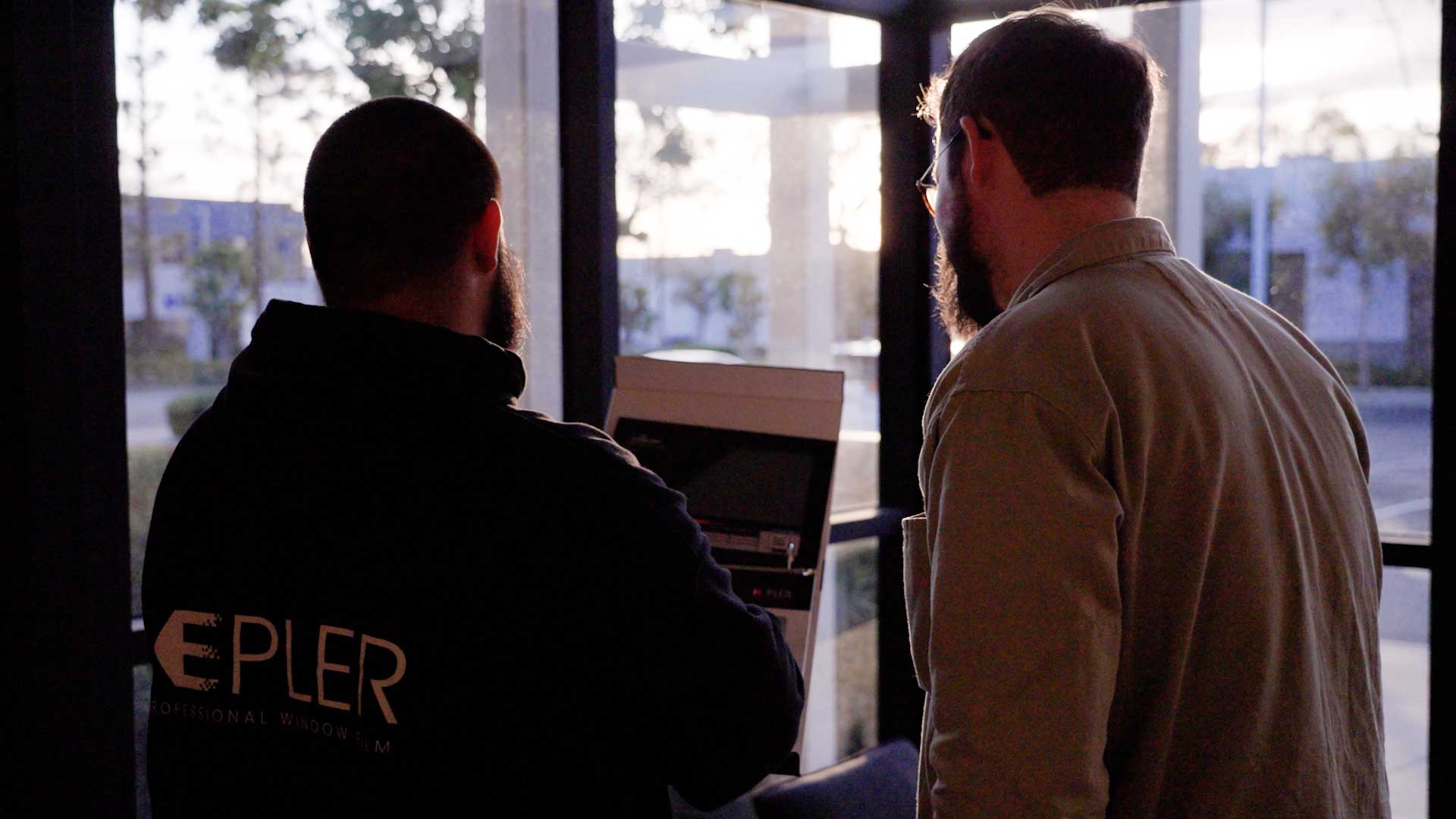 Kepler Specialist Discussing Commercial Window Tinting Prices with Customer in North Carolina