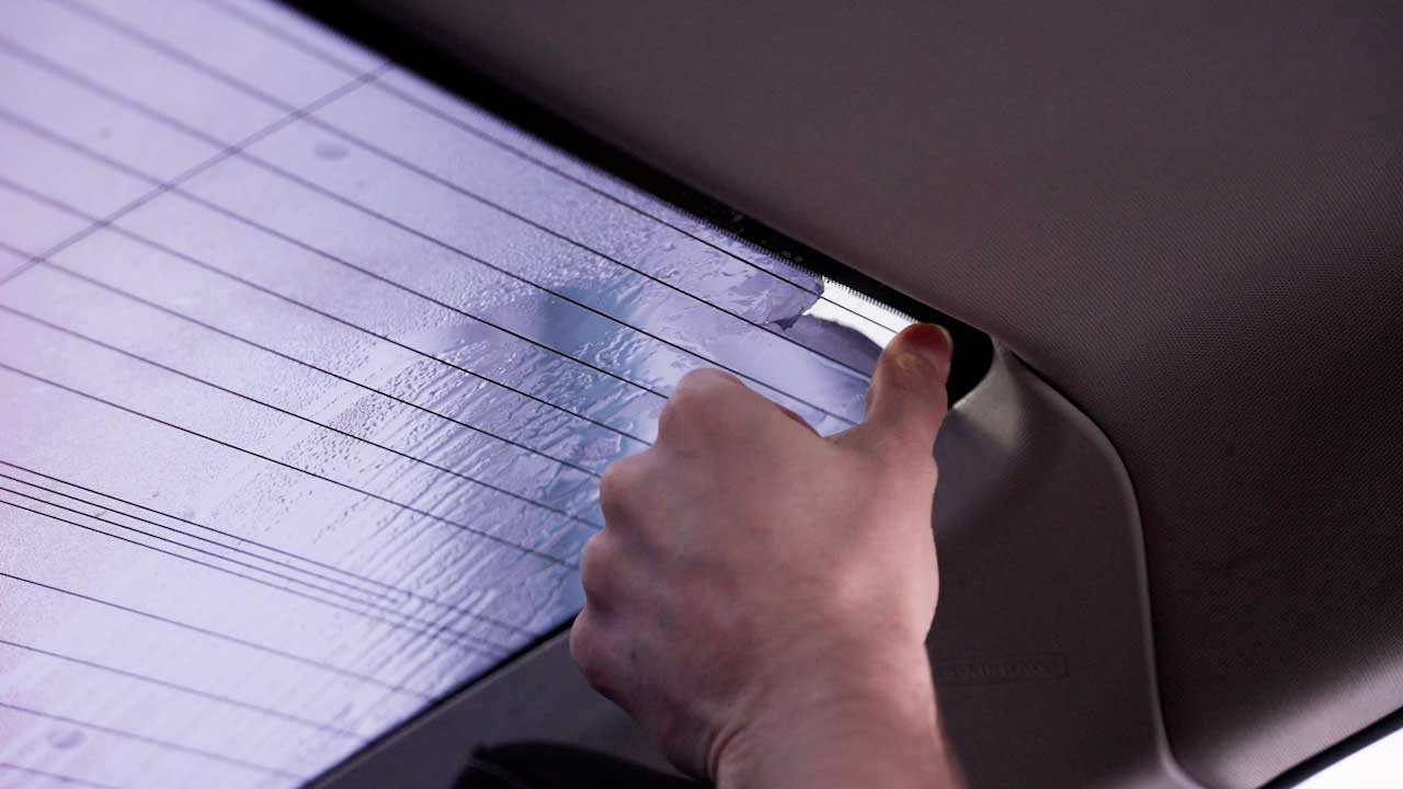 Skilled Tesla Window Tint Removal in Addison