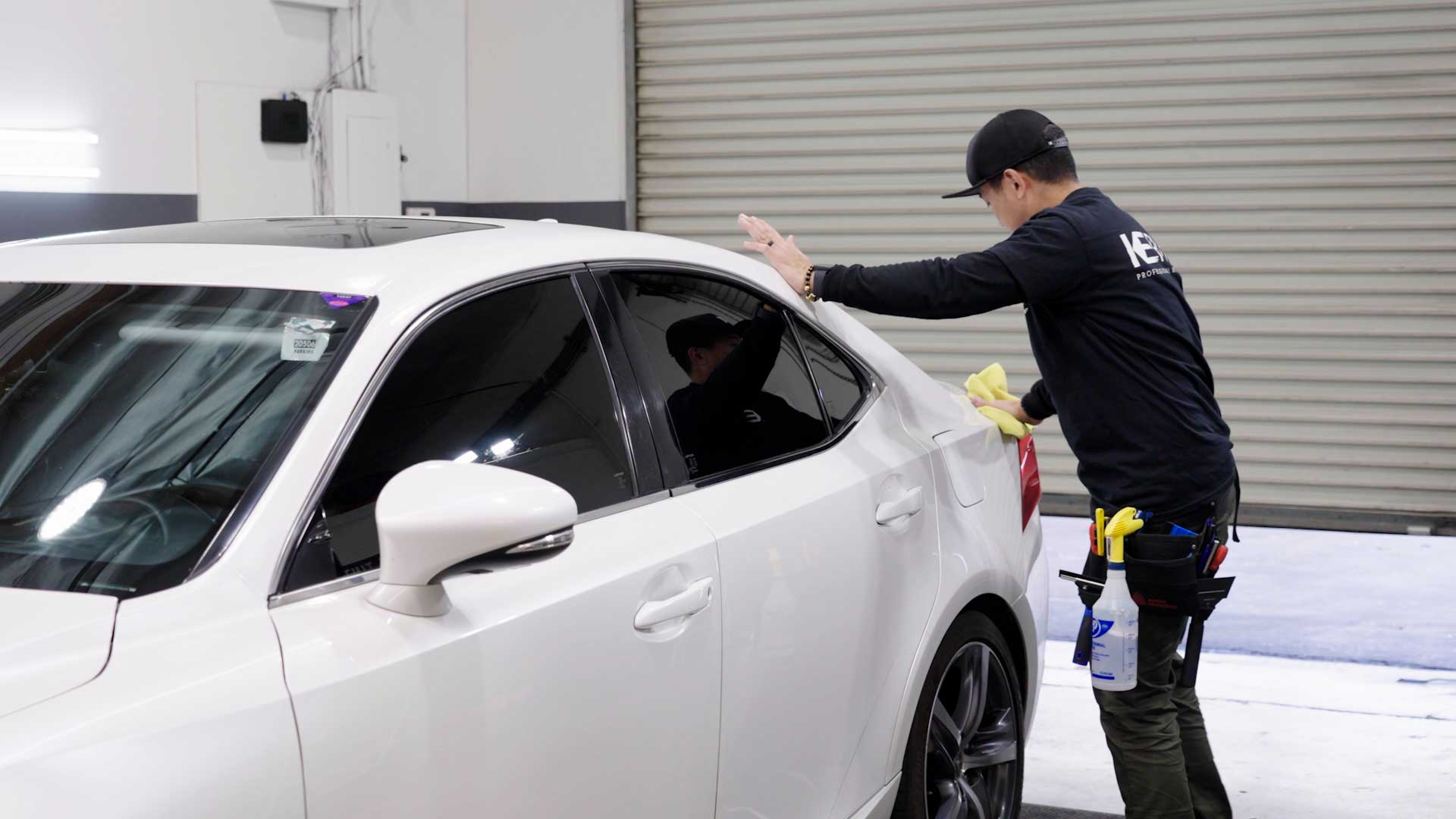Expert Tesla Glass Tint being cleaned after tinting in Caledonia