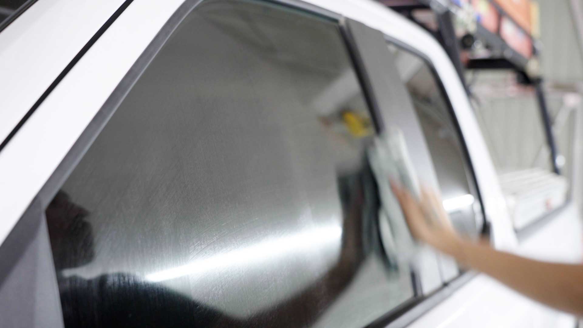 Expert Tesla Glass Tinting being cleaned after tinting in Napa