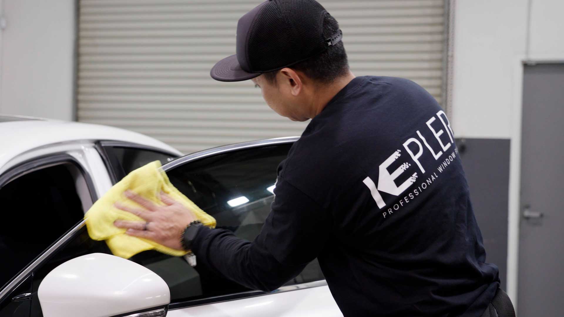 Expert Tesla Window Tinting being cleaned after tinting in Turlock