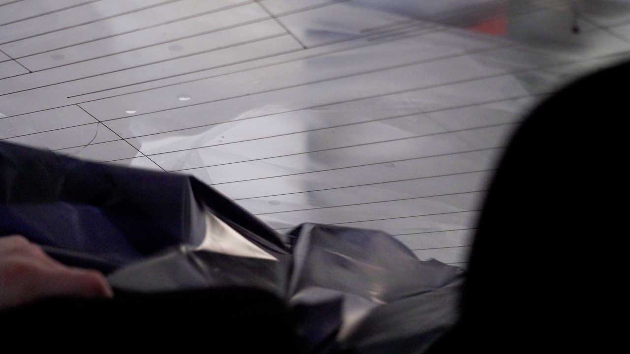 Professional Tesla Glass Tinting Removal in New Milford
