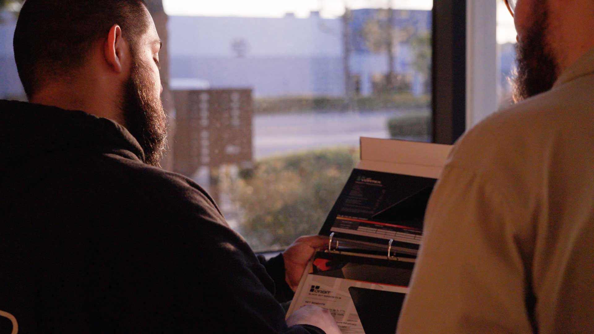 Kepler Dealer Showing Customer the Benefits of Commercial Window Film in Kansas