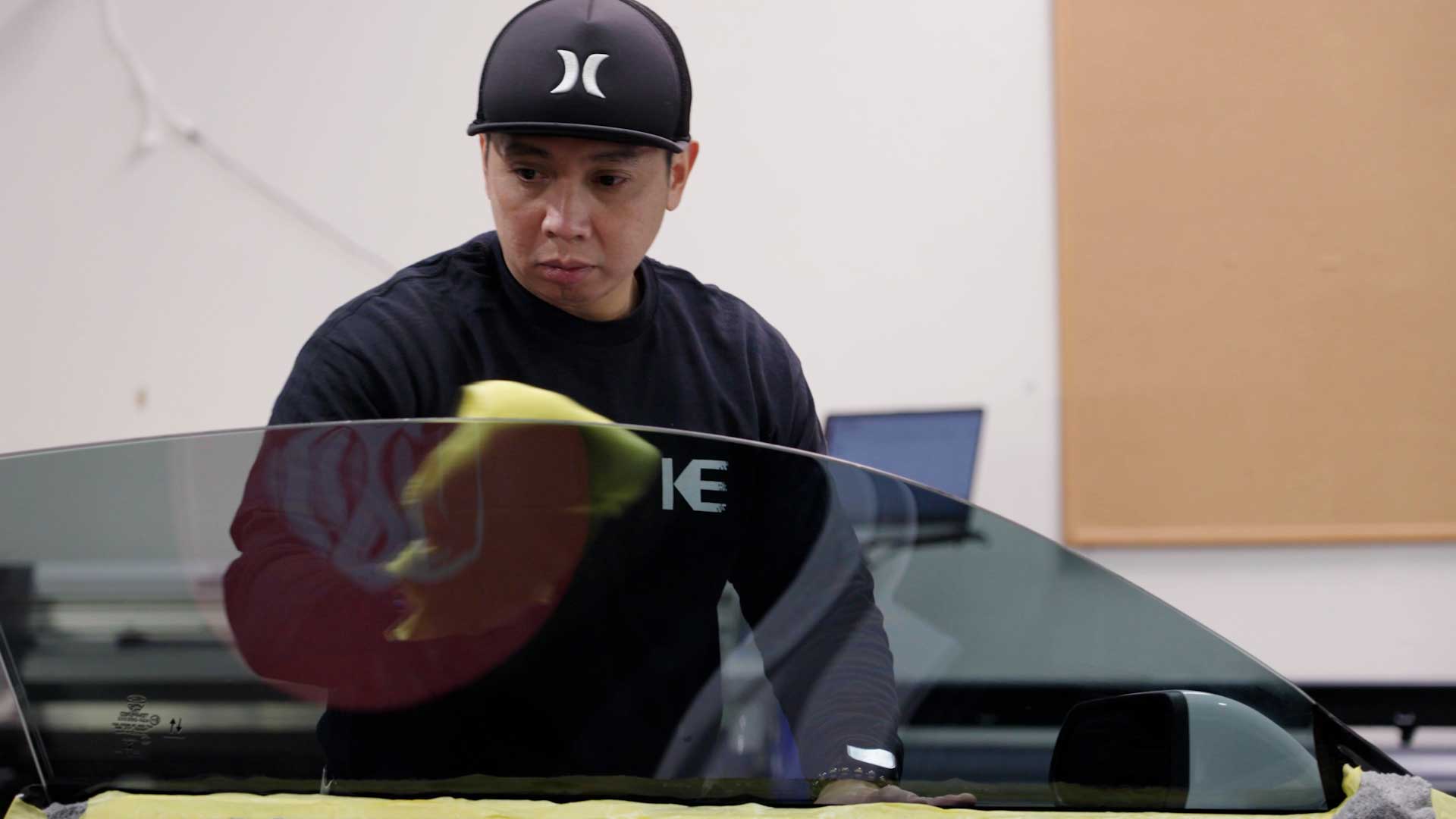 Skilled Tesla Glass Tint being cleaned after tinting in Salem