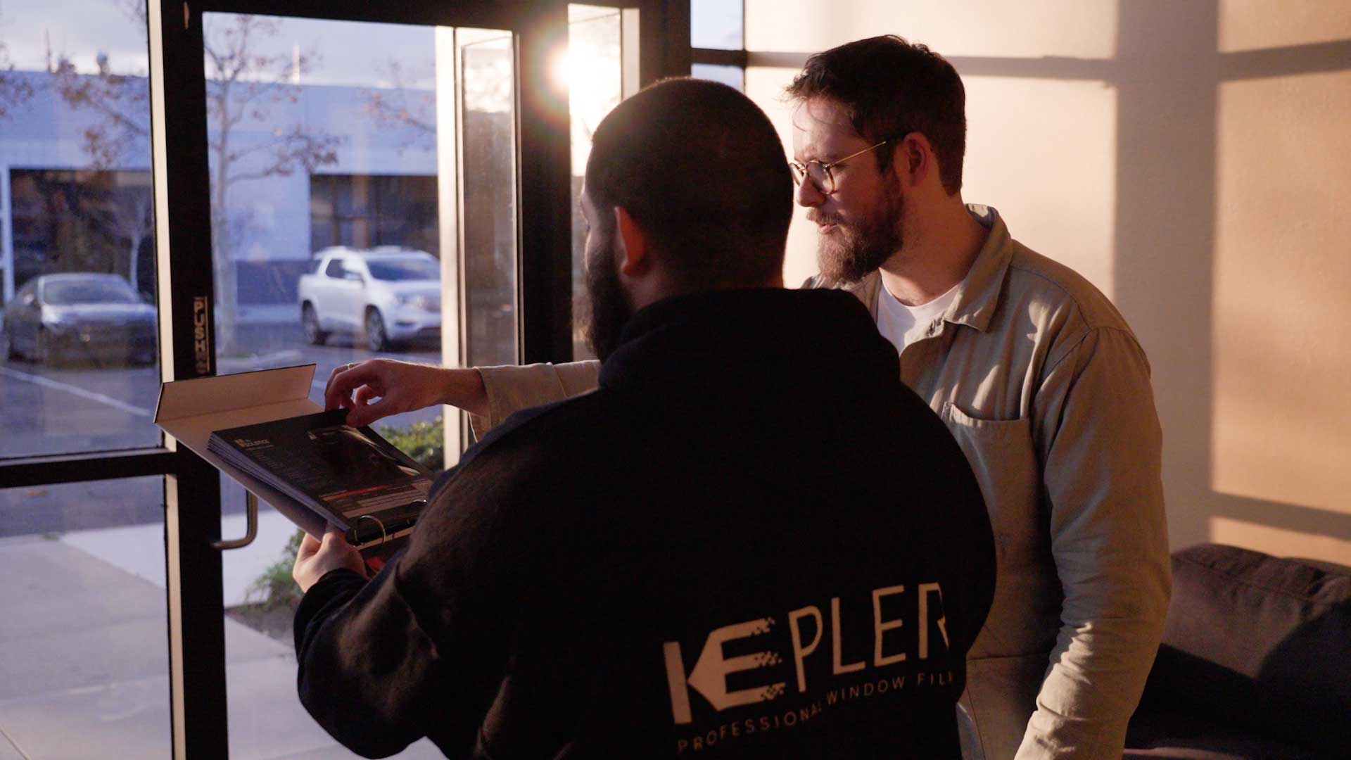 Kepler Dealer Showing Customer the Benefits of Commercial Window Film in Colorado