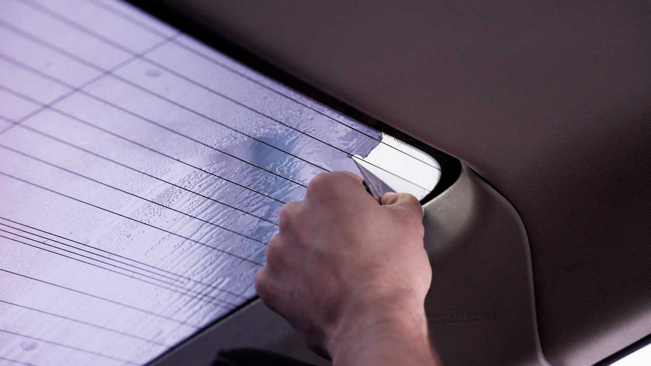 Expert Tesla Glass Tint Removal in Conway