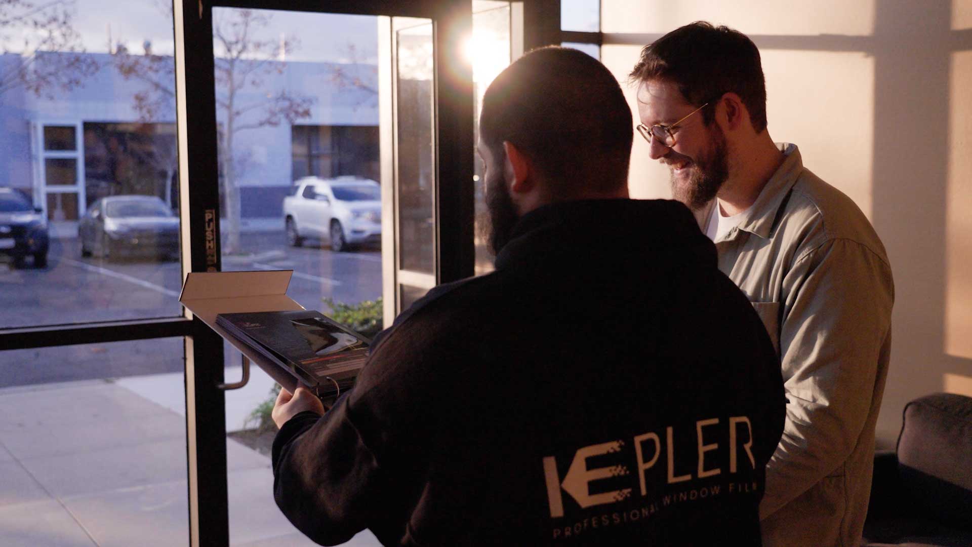 Kepler Dealer Cleaning Office Window Film in New York