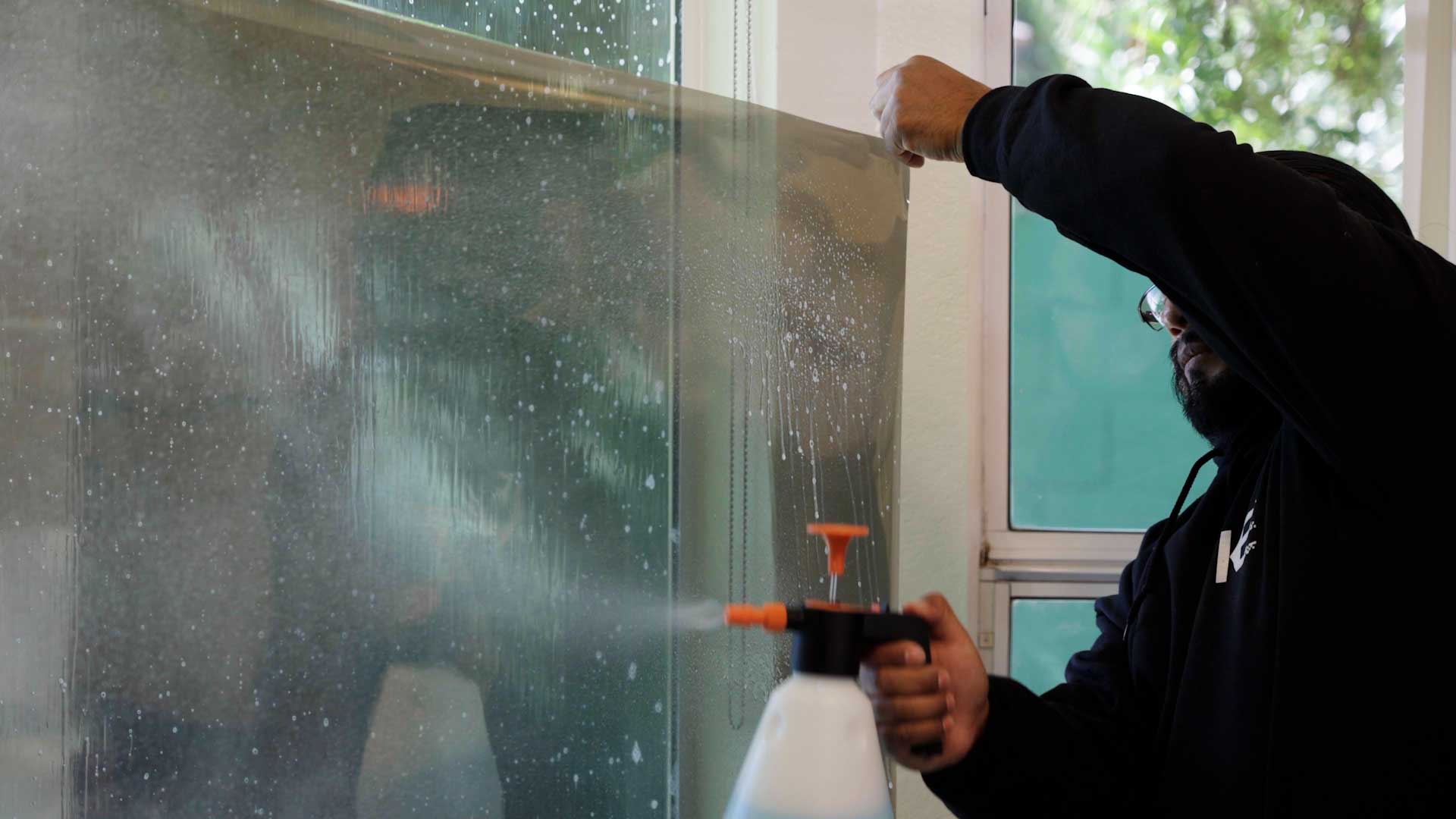 Kepler Home Window Tinting Specialist Preparing Film for Legal Residential Application in New York