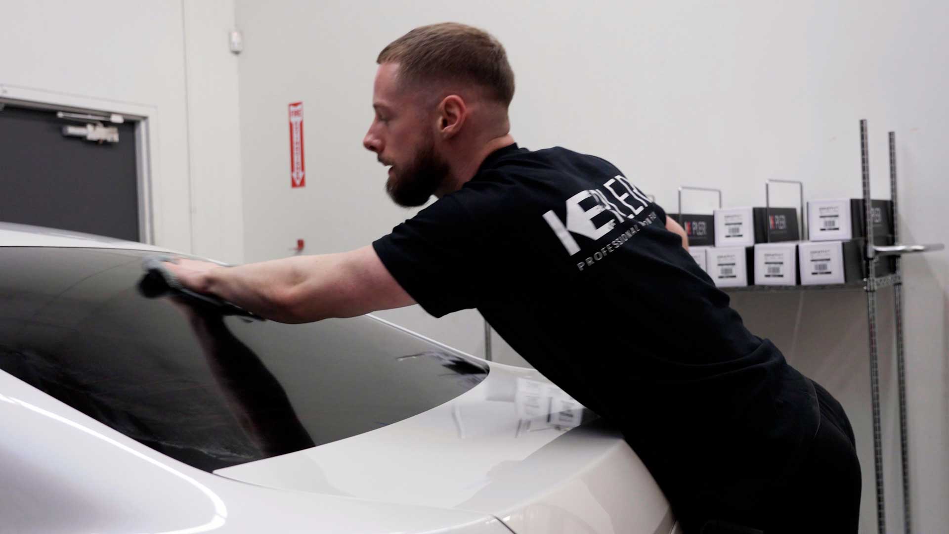Professional Tesla Window Tinting being cleaned after tinting in Queen Creek