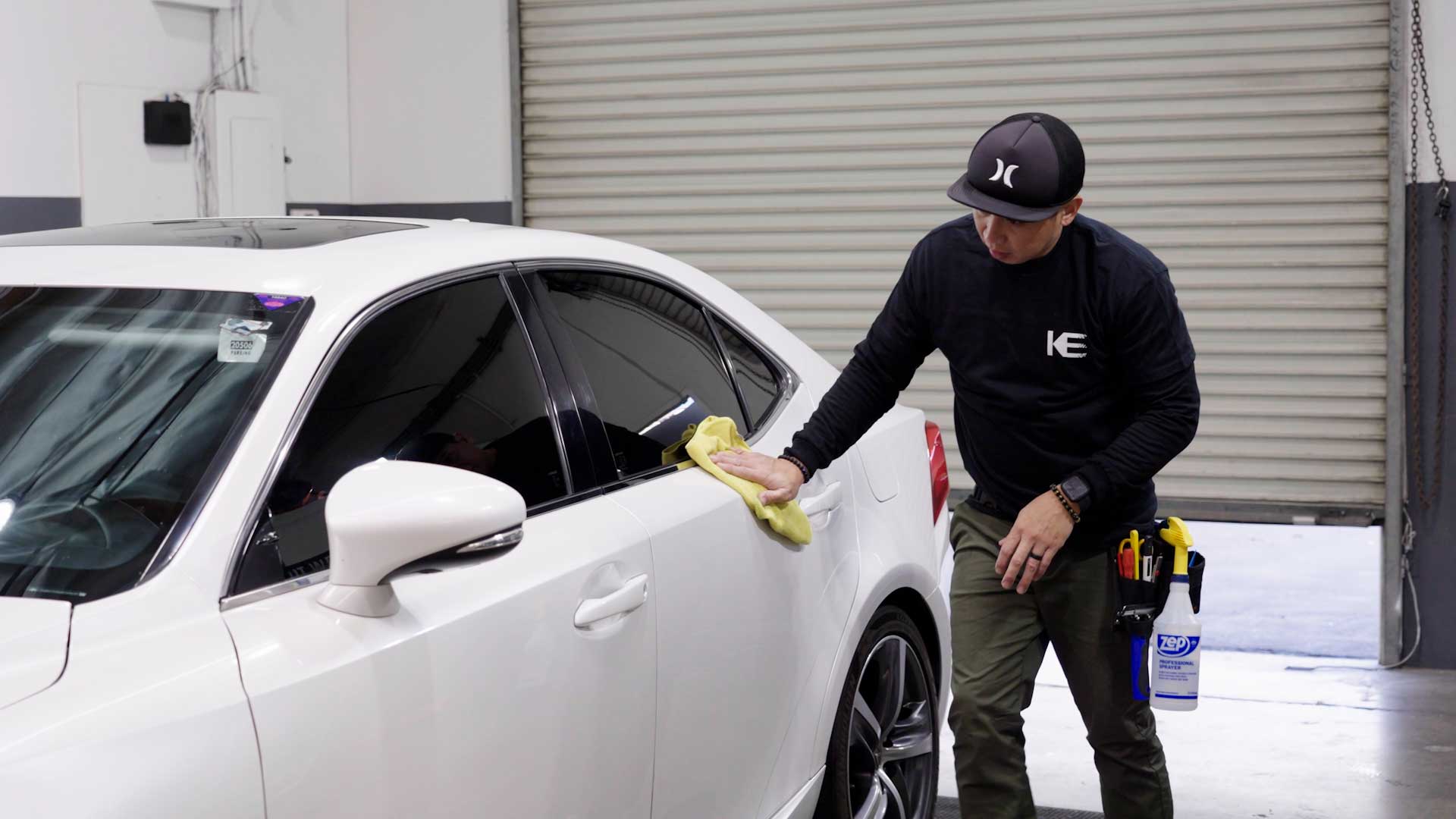 Professional Tesla Window Tint being cleaned after tinting in Apollo Beach