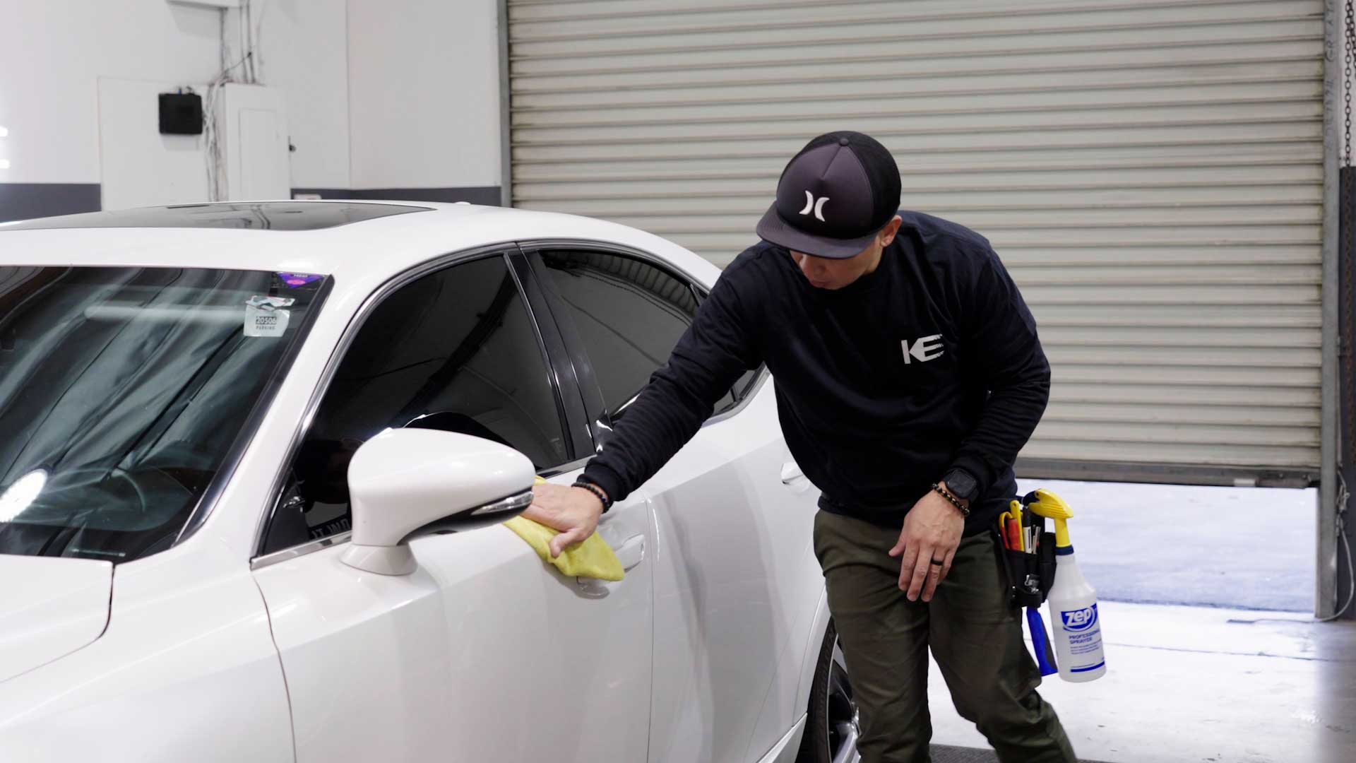 Expert Tesla Window Tinting being cleaned after tinting in Dunedin