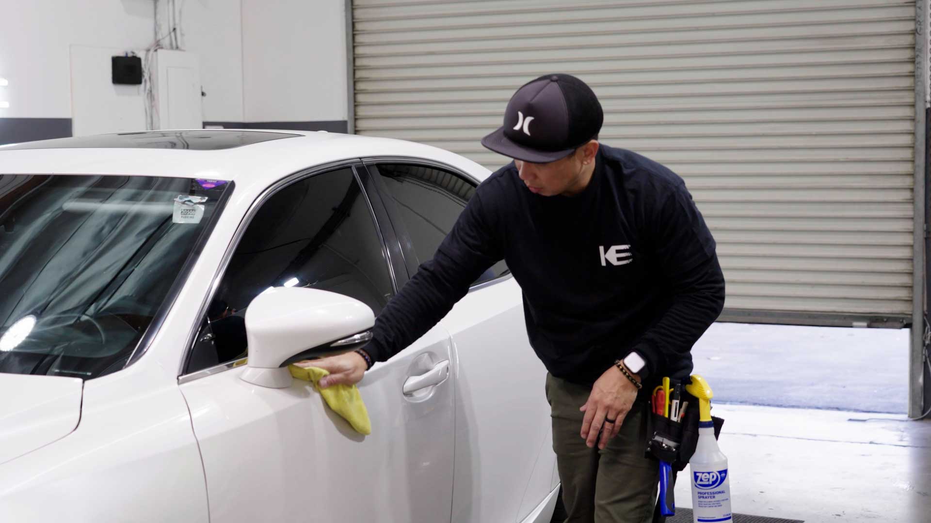 Skilled Tesla Window Tint being cleaned after tinting in West Chester