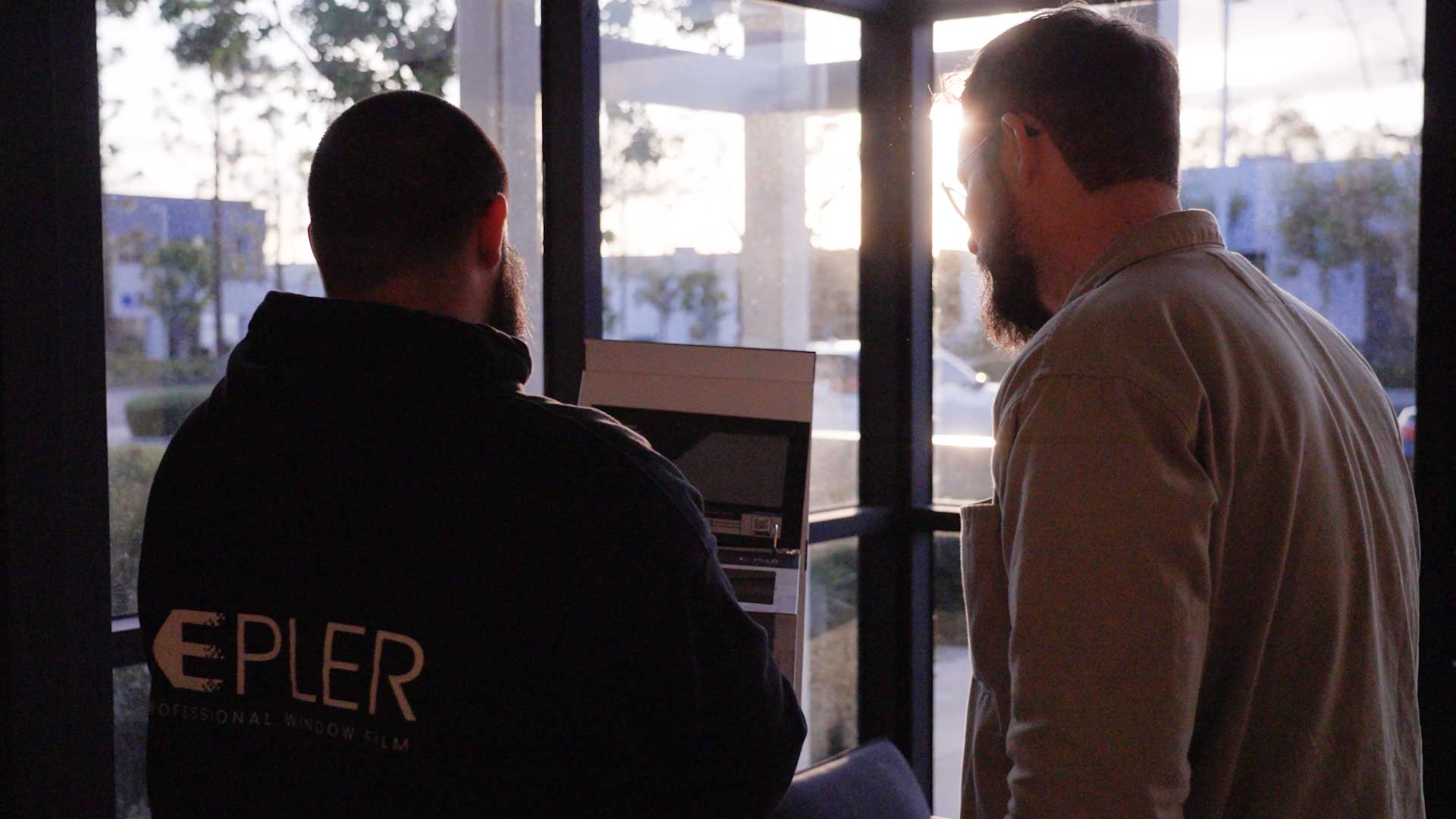 Kepler Dealer Cleaning Office Window Film in Michigan