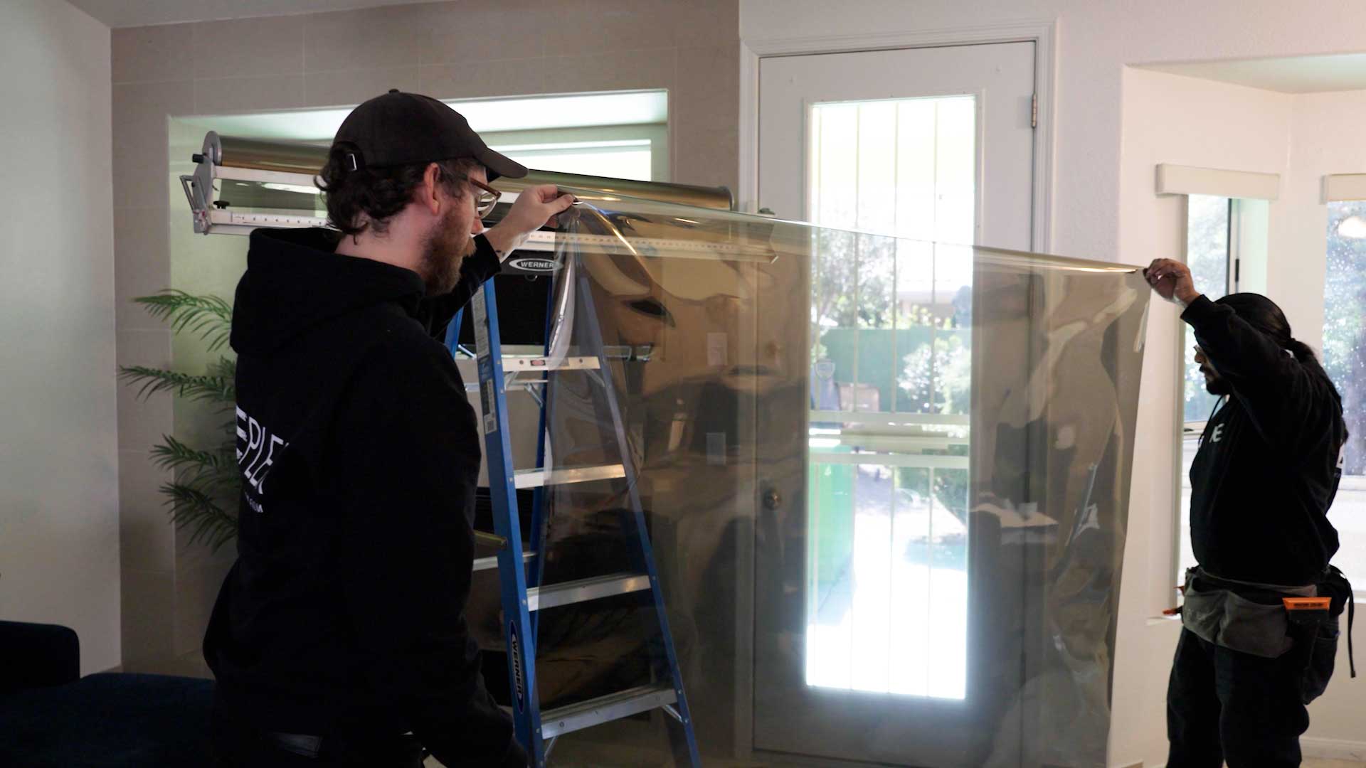 Preparing a Window for Anti-Graffiti Film Installation in Wisconsin