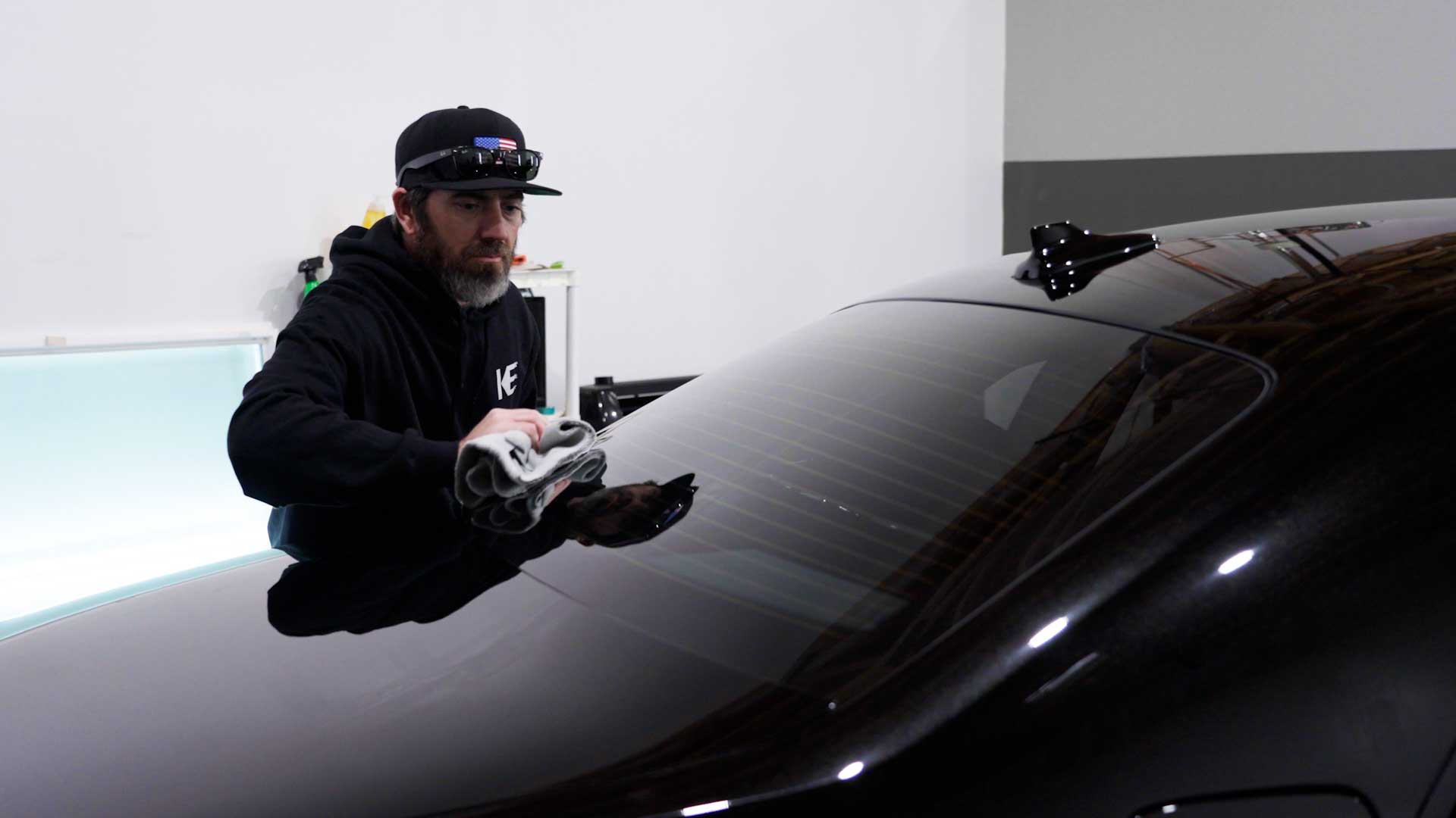 Professional Electric Vehicle Window Tinting being cleaned after tinting in Spring Valley