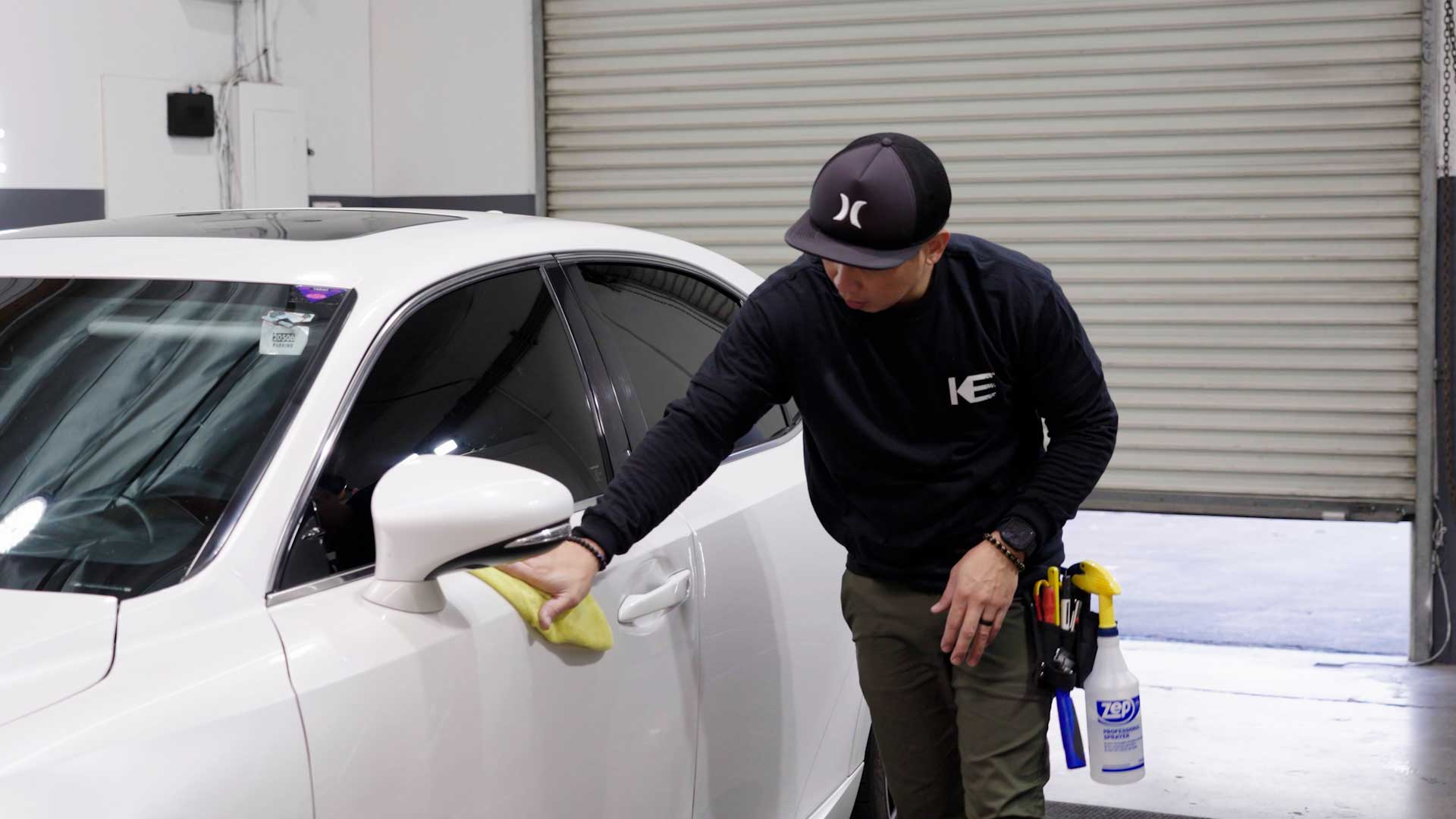 Expert Electric Vehicle Window Tinting being cleaned after tinting in Tulsa