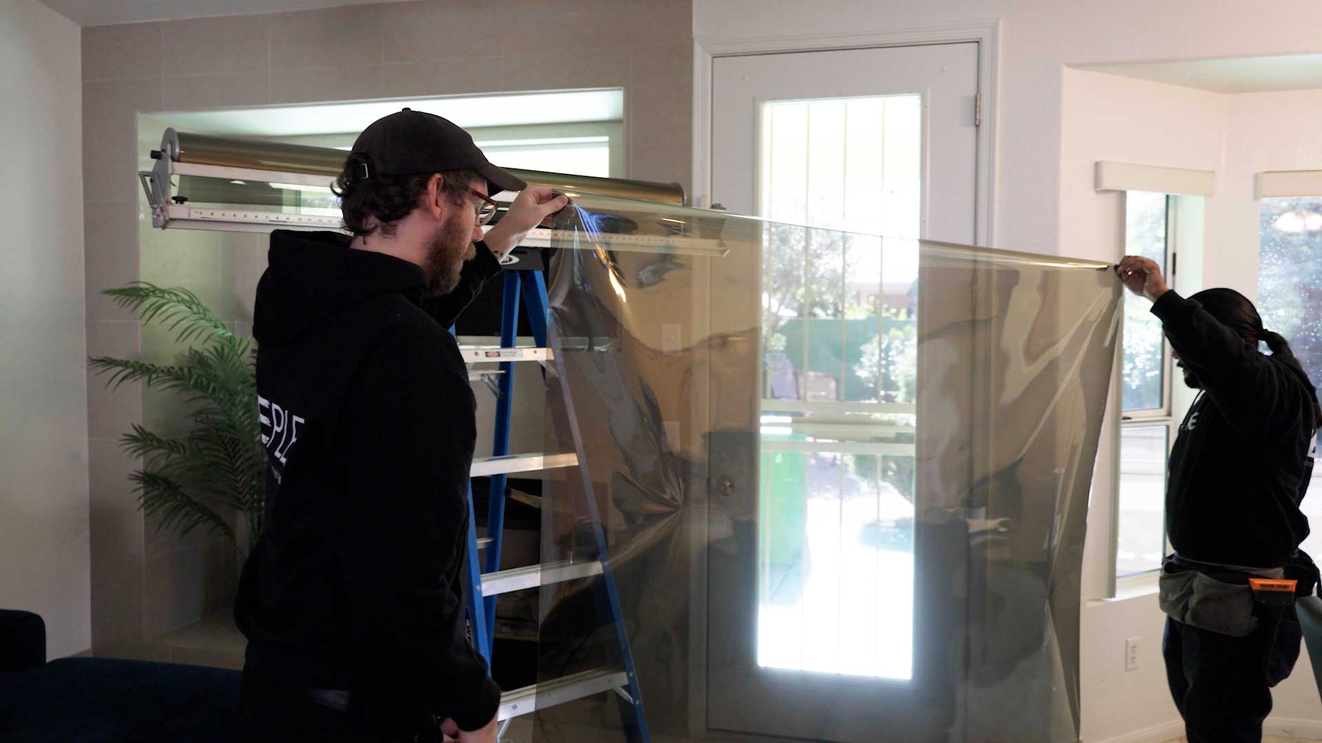Preparing a Window for Anti-Graffiti Film Installation in Washington