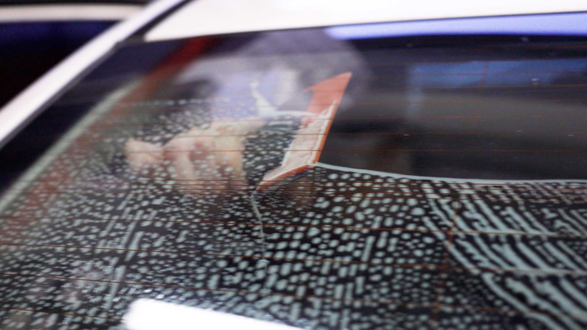 Professional Tesla Glass Tint preparation in Genesee