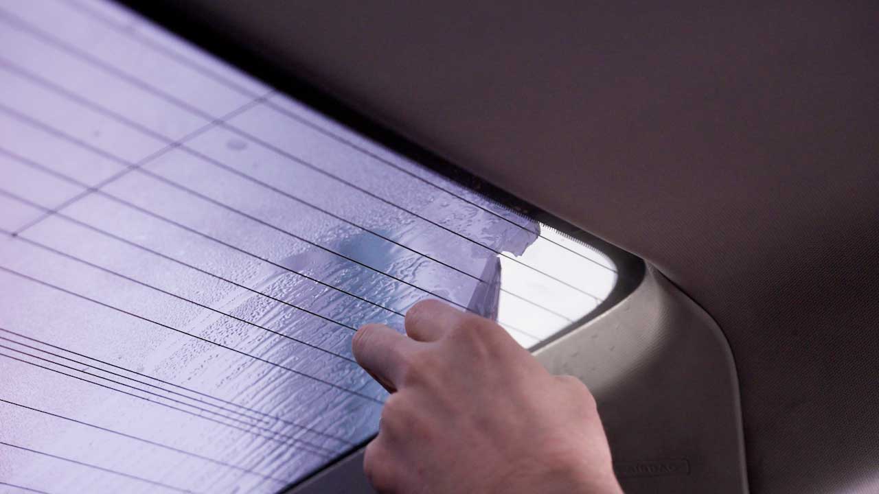 Professional Tesla Window Tinting Removal in Holland