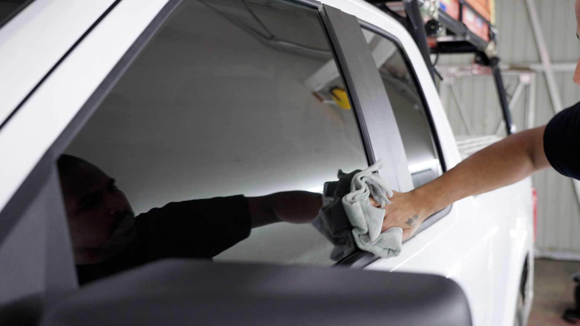 Professional Tesla Window Tint being cleaned after tinting in Alameda