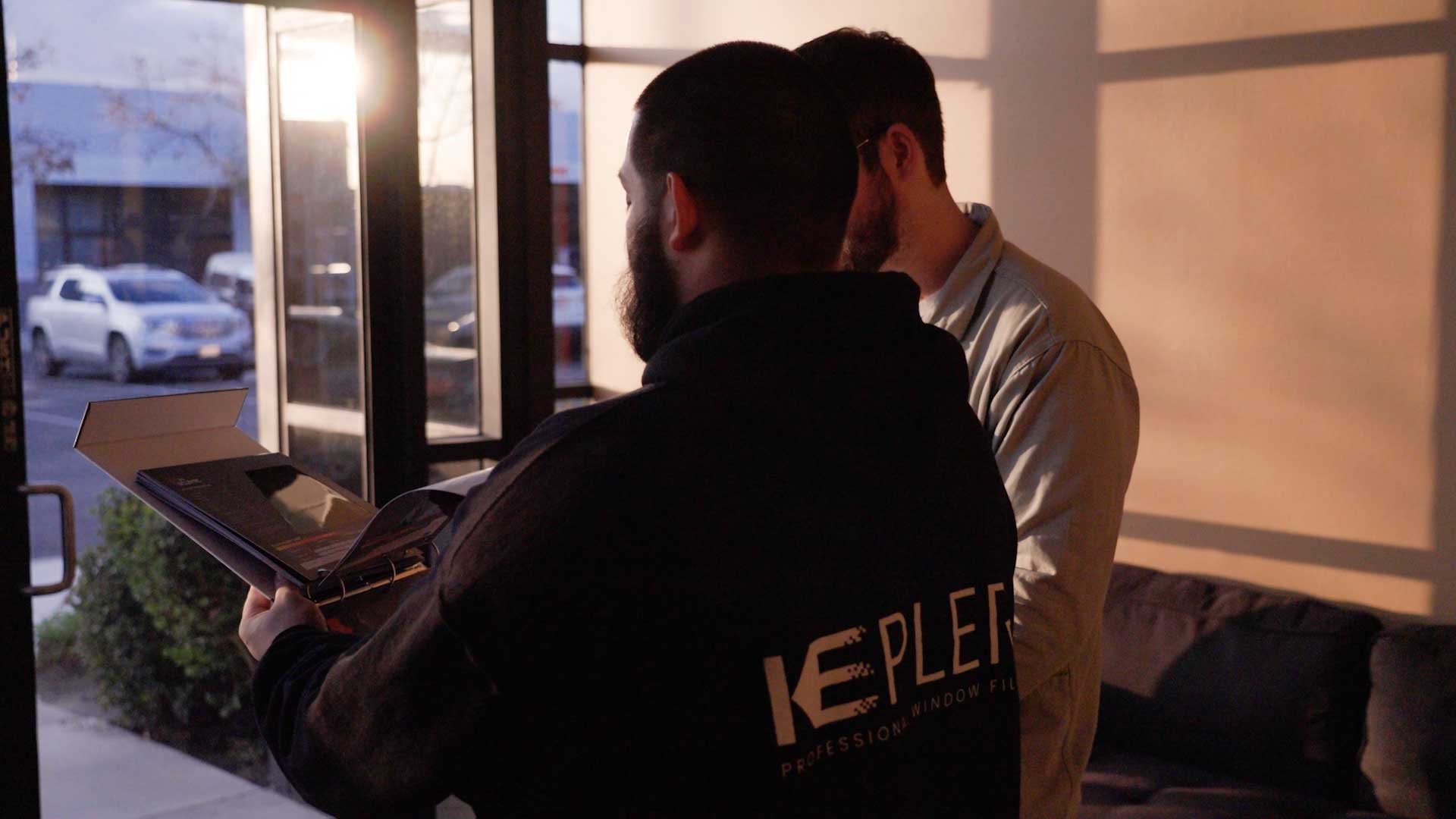 Kepler Dealer Showing Customer the Benefits of Commercial Window Film in Idaho