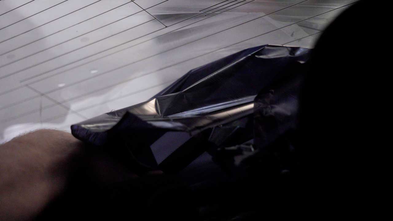 Skilled Tesla Window Tint Removal in Douglasville