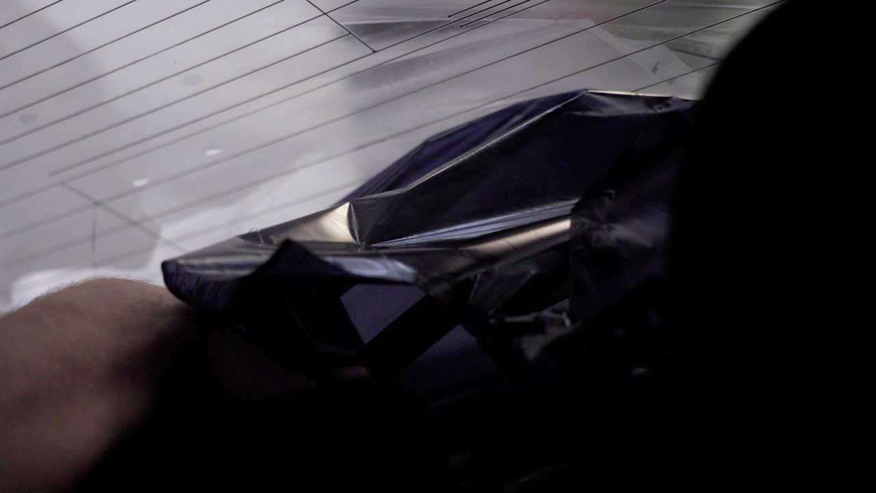 Expert Tesla Glass Tinting Removal in Lithia Springs