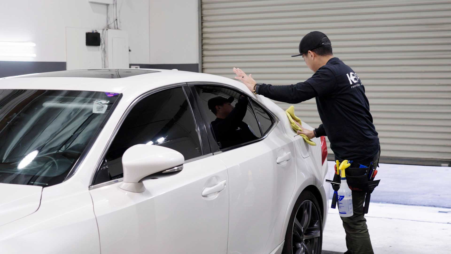 Professional Tesla Window Tinting being cleaned after tinting in Miamisburg