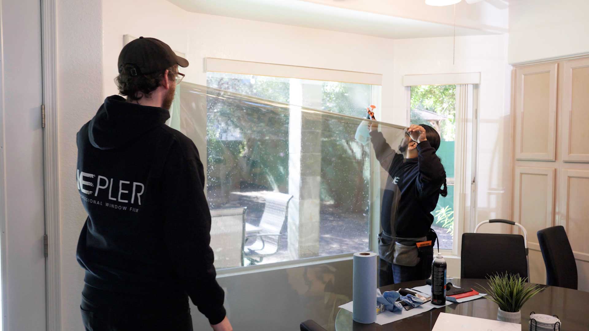 Kepler Home Window Tinting Specialist Preparing Film for Legal Residential Application in North Dakota