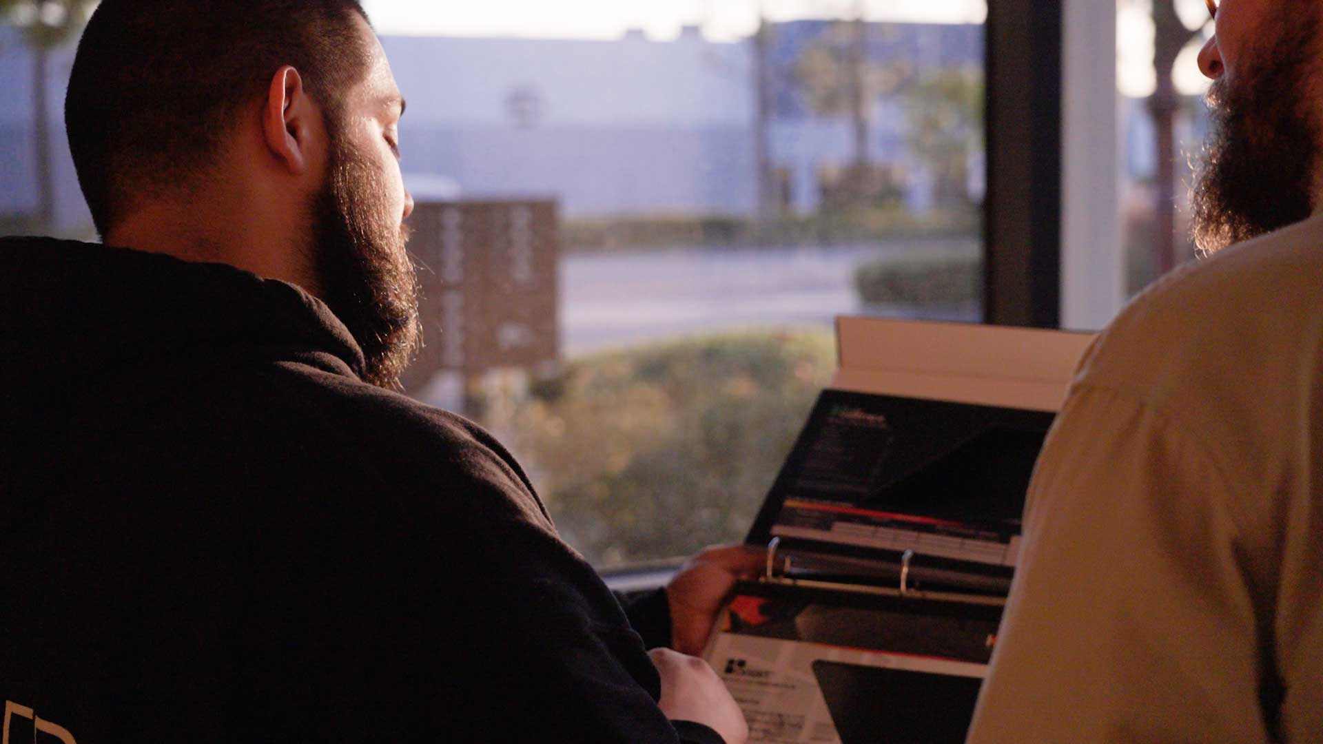 Kepler Dealer Showing Customer the Benefits of Commercial Window Film in Utah