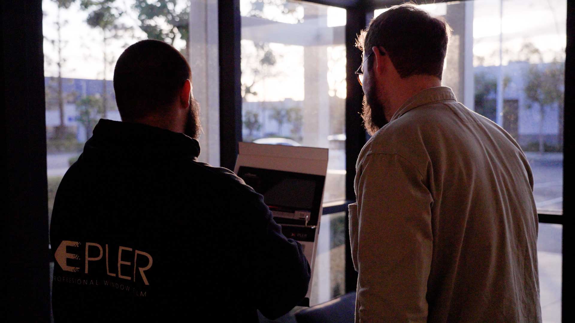 Kepler Specialist Discussing Commercial Window Tinting Prices with Customer in Montana