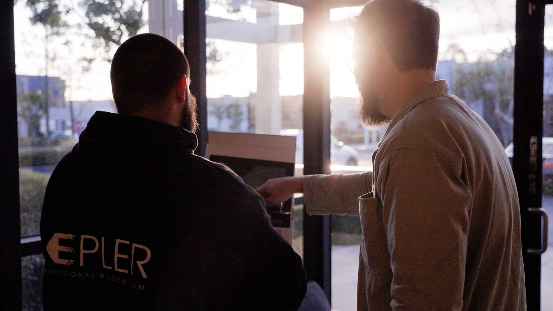 Kepler Dealer Showing Customer the Benefits of Commercial Window Film in Nebraska