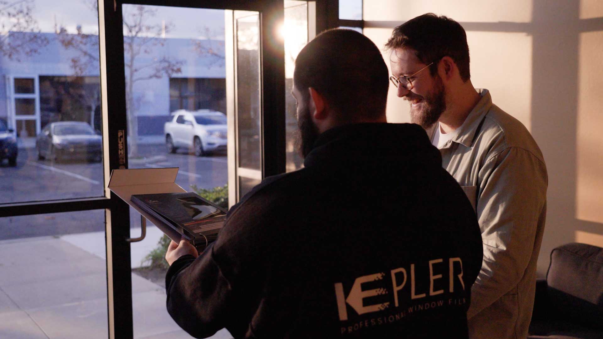 Kepler Specialist Discussing Commercial Window Tinting Prices with Customer